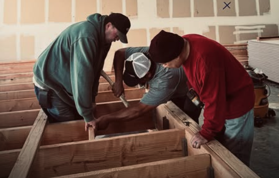 People helping with construction and improvements at The Bridge Church.